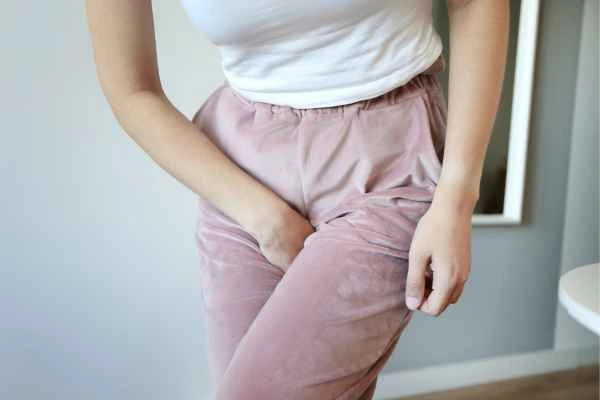 woman struggling with urine incontinence Worthing